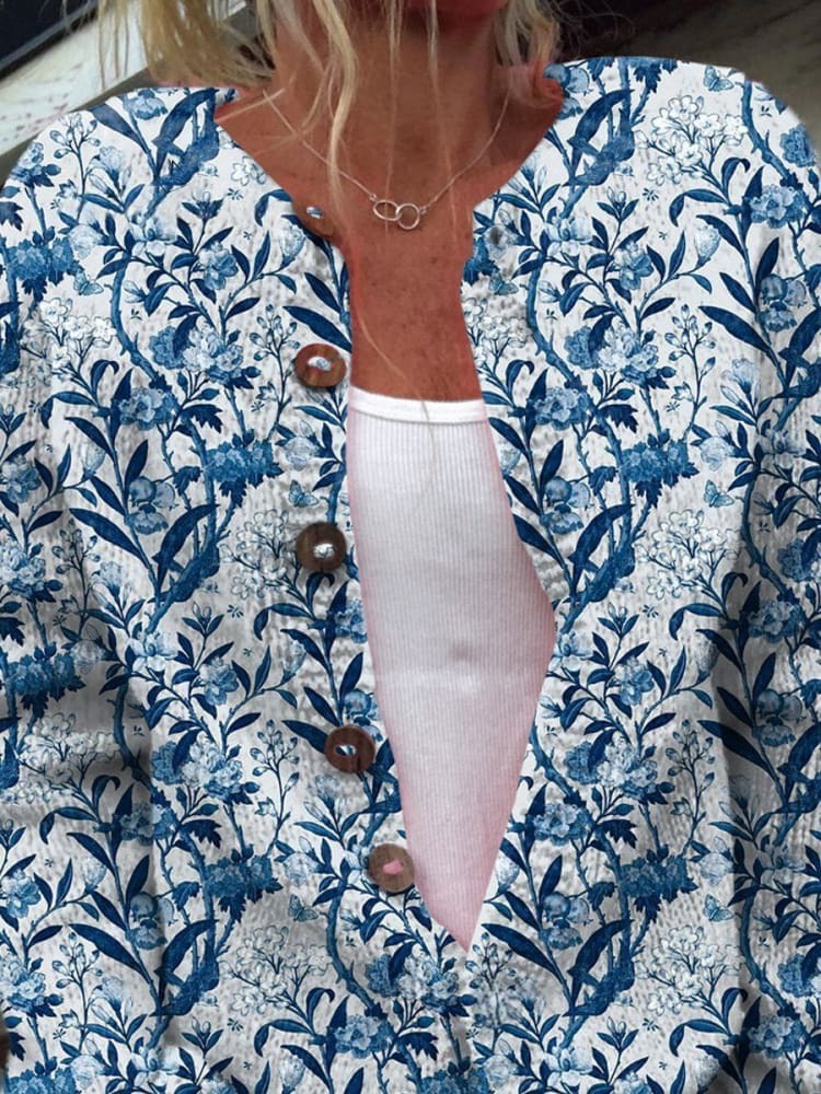 Elegant blue and white floral print cardigan with buttons
