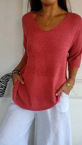 Plain knitted ladies' blouse with 3/4 sleeves and V-neck