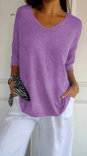 Plain knitted ladies' blouse with 3/4 sleeves and V-neck
