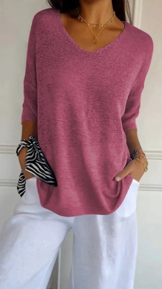 Plain knitted ladies' blouse with 3/4 sleeves and V-neck