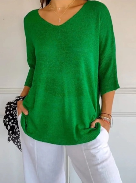 Plain knitted ladies' blouse with 3/4 sleeves and V-neck