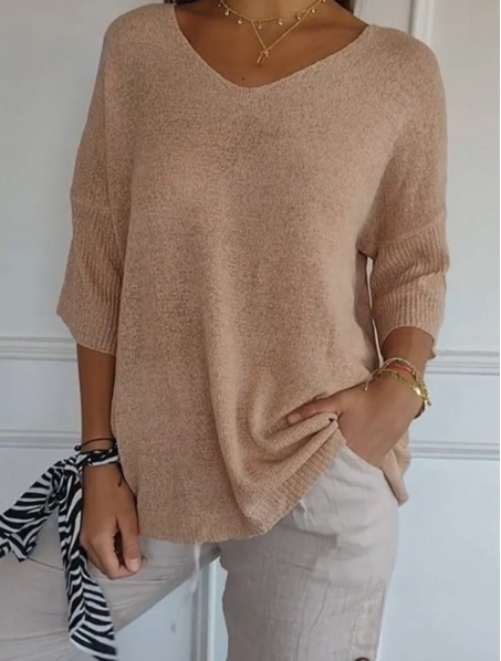 Plain knitted ladies' blouse with 3/4 sleeves and V-neck